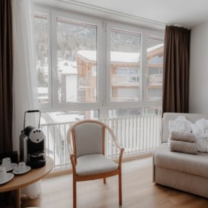 Cozy premium room with stunning Grächen mountain views at Hotel Grächerhof